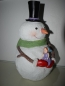 Winterzeit Weihnachtszeit Schneemann mit Mädchen
