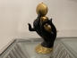 Exklusiver Buddha Skulptur Buddha Gold sitzend in schwarzer Hand